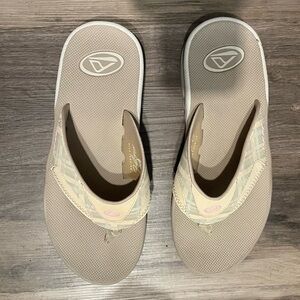 Women’s size 10 Reef flip flops. Light tan/beige. Great condition. Comfortable